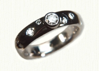 14KW polka dot wedding bands with center .25ct diamond