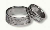 Platinum Bands with Scales,<br>Fleur de Lis, Bear, and continents