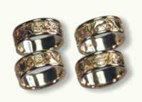 18kt yellow gold band<br>Sun, Moon, Hearts, Dolphins, and Harley Davidson
